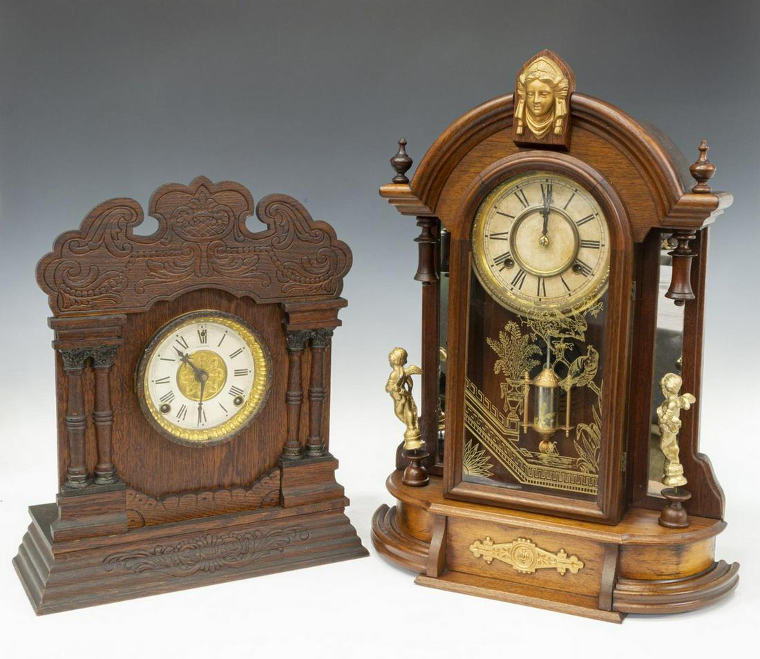 (2) AMERICAN WATERBURY & SESSIONS KITCHEN CLOCKS: (lot of 2) American kitchen clocks, late 19th/ early 20th c., each in a "gingerbread" press carved wood case, retaining key and pendulum, comprising: (1) Waterbury "Oxford," having time and strike mov