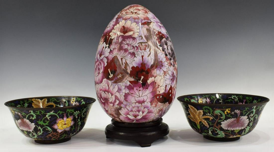 (3) CHINESE CLOISONNE ENAMEL EGG & BOWLS: (lot of 3) Chinese cloisonne enamel objects, including: (1) cloisonne decorative floral egg, with wooden stand, approx 14"h; (2) multicolor longevity bowls, decorated with vines and floral motifs, app