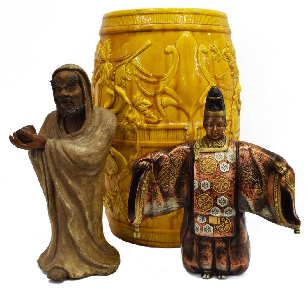 (3) ASIAN FIGURES & BARREL GARDEN STOOL: (lot of 3) Asian figures and garden stool, comprising: (1) yellow porcelain barrel-form garden stool, having pierced top, foliated vine and floral decoration all over, chip to bottom rim, approx 19"h,