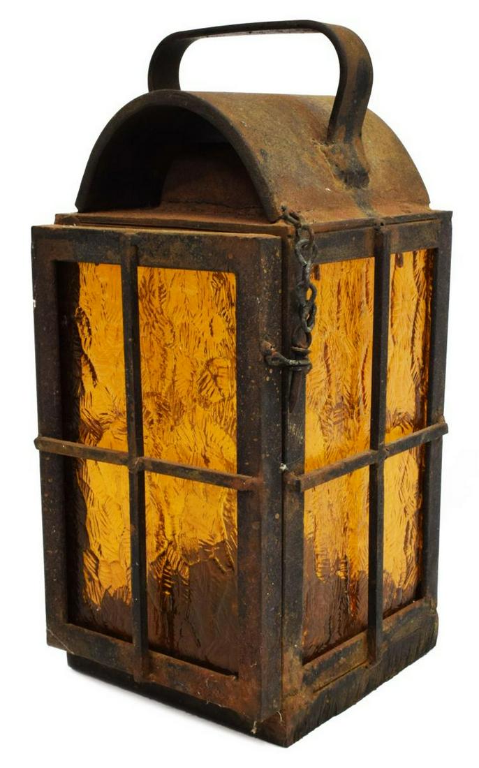 VINTAGE IRON FRAMED KEROSENE/ ALCOHOL LANTERN: Vintage heavy iron framed lamp with interior color glass panels, a circular interior frame holds the kerosene or alcohol bottle labeled "Da Bo Corporation Perma Lamp Fuel," lamp: approx 11.5"h, 5"w, 5