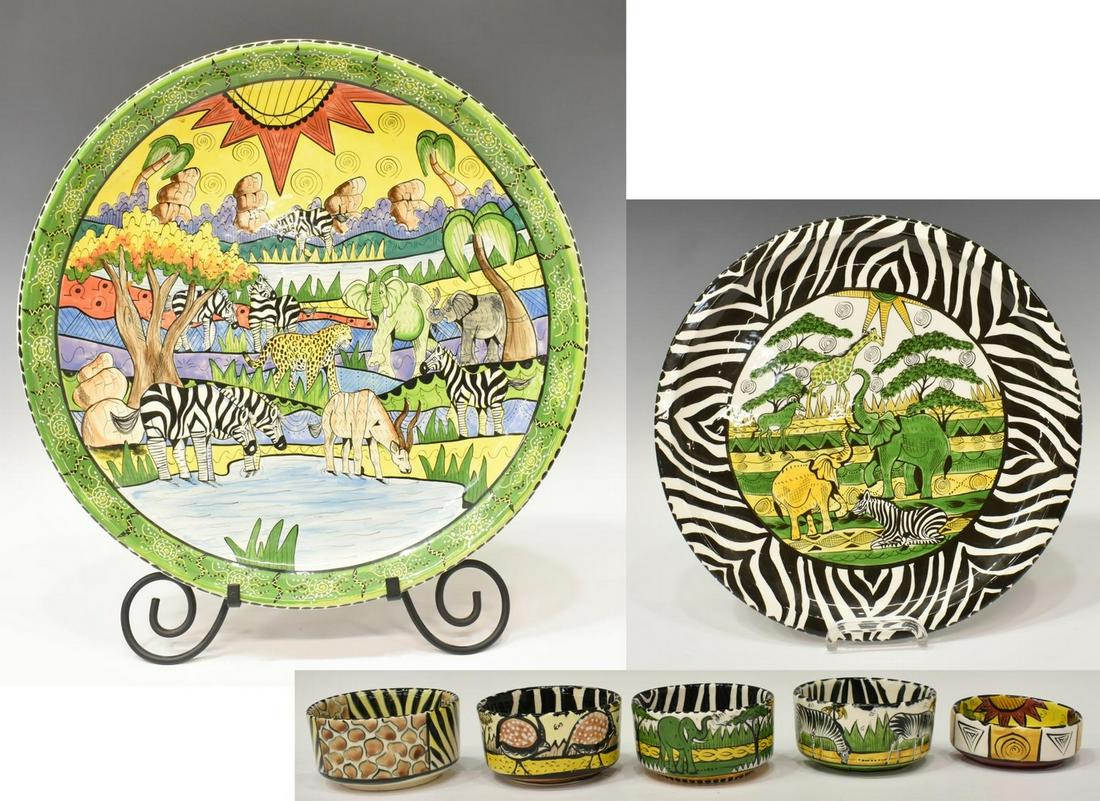 (7) PENZO ZIMBABWE HAND-PAINTED CERAMIC TABLEWARE: (lot of 7) Penzo ceramic tableware, hand painted in Zimbabwe, with various African animal motifs, including: (2) chargers, (one) with stand, largest: approx 17.5"diam; (5) small dishes, of similar siz