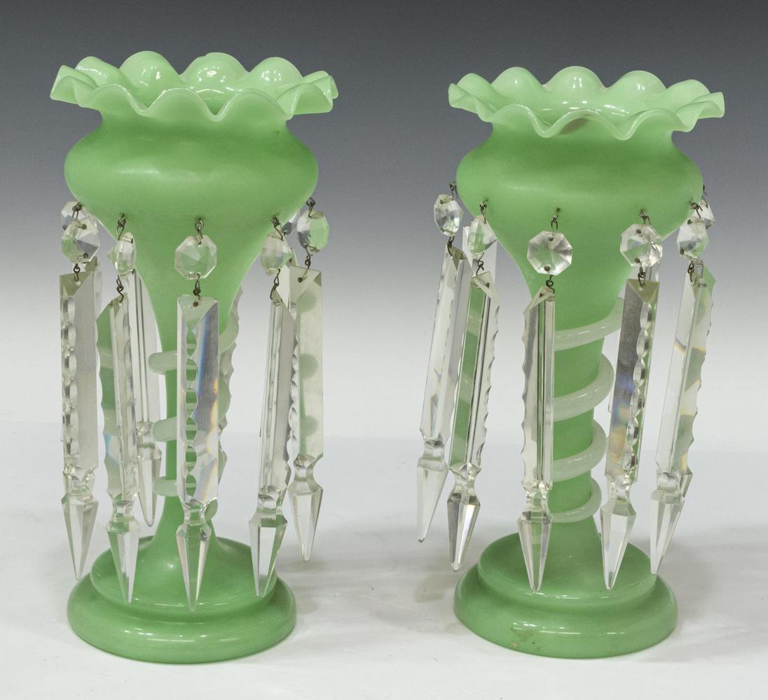 (2) VICTORIAN GREEN OPALINE GLASS MANTEL LUSTERS: (pair) Victorian green opaline glass mantel lusters, having ruffled rim, snake wrapped around standard, each hung with clear prisms, rising on circular foot, remnants of gilt decoration, one with surf