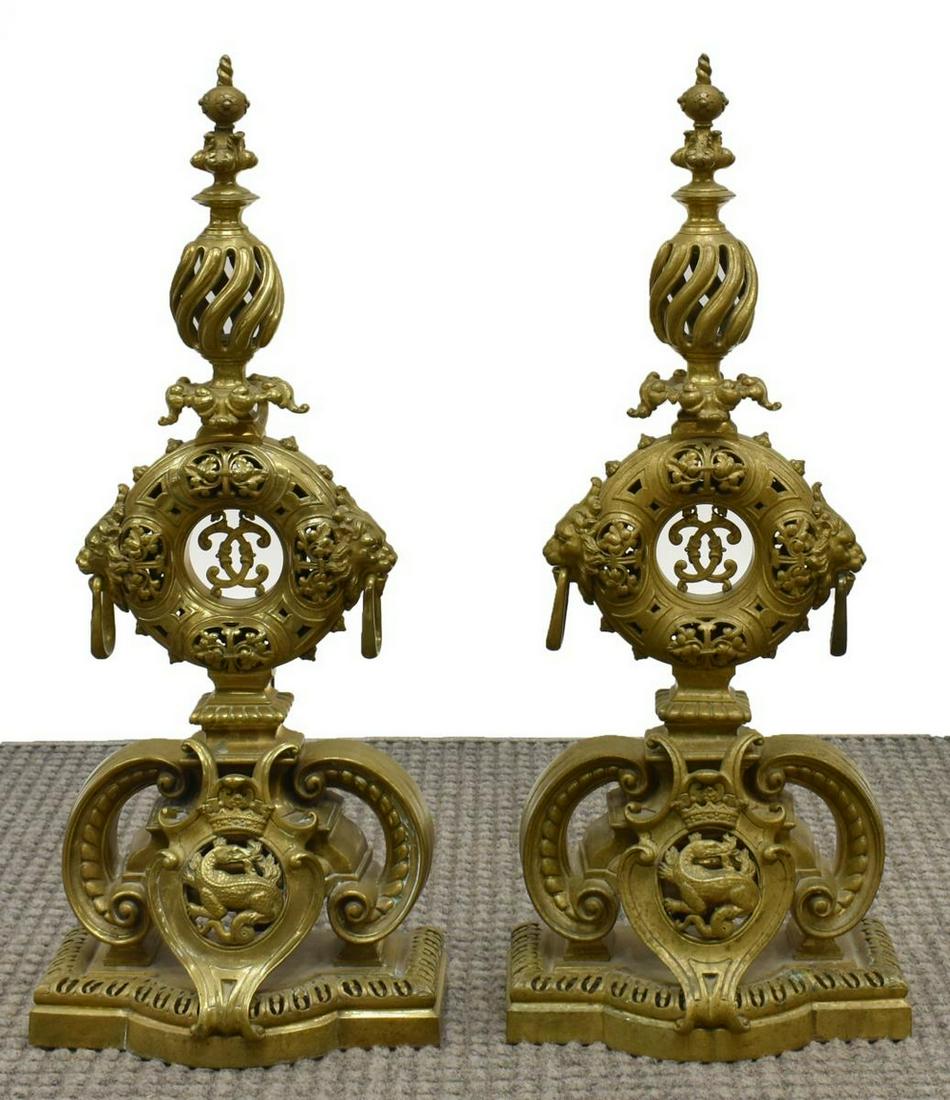(2) FRENCH GILT BRONZE LION & SALAMANDER ANDIRONS: (pair) French gilt bronze andirons, orb finial, over round standard with lion handles and foliate ornamentation around center monogram, lower section with crown and fire salamander crest, on pierced s