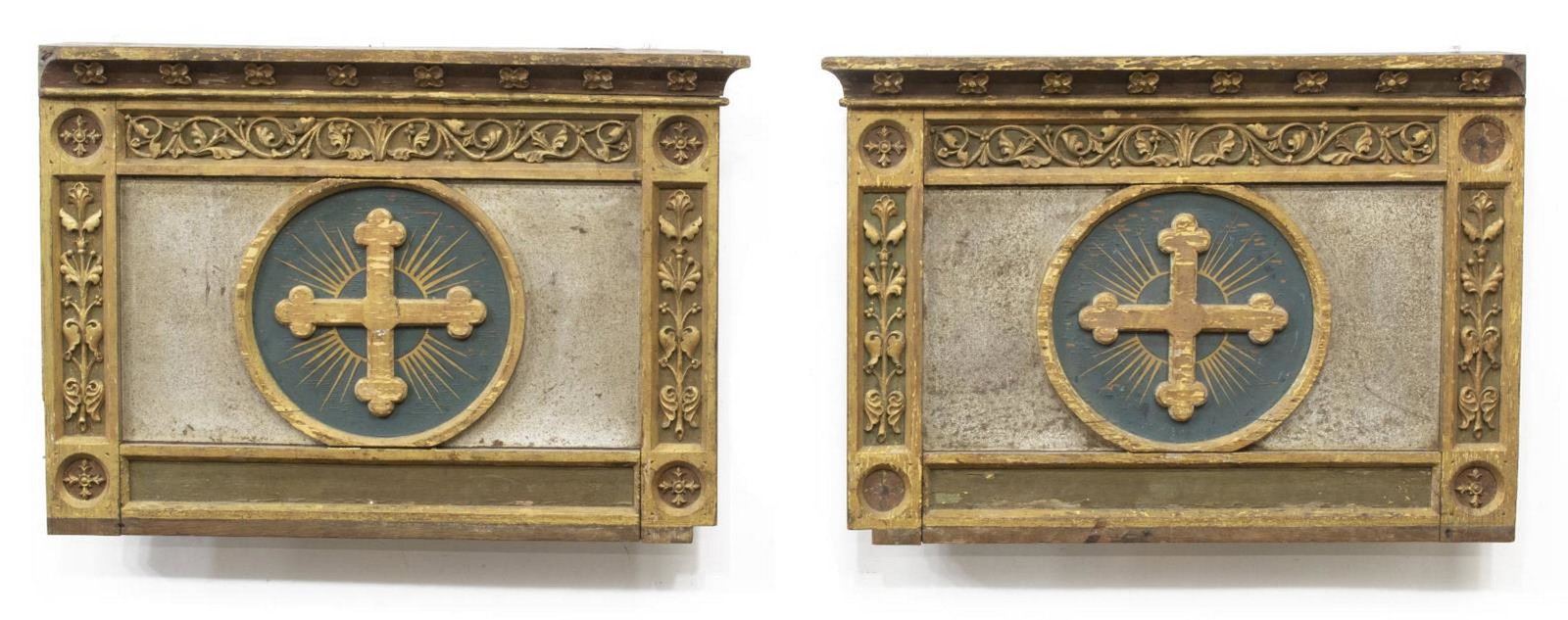 (2) ITALIAN RELIGIOUS PAINTED ALTAR PANELS 19TH C.: (pair) Italian religious parcel gilt altar panels, 19th c., each having molded top shelf, parcel gilt scrolling foliate accents, round central register, depicting radiating cross, approx 20.5"h, 29.25