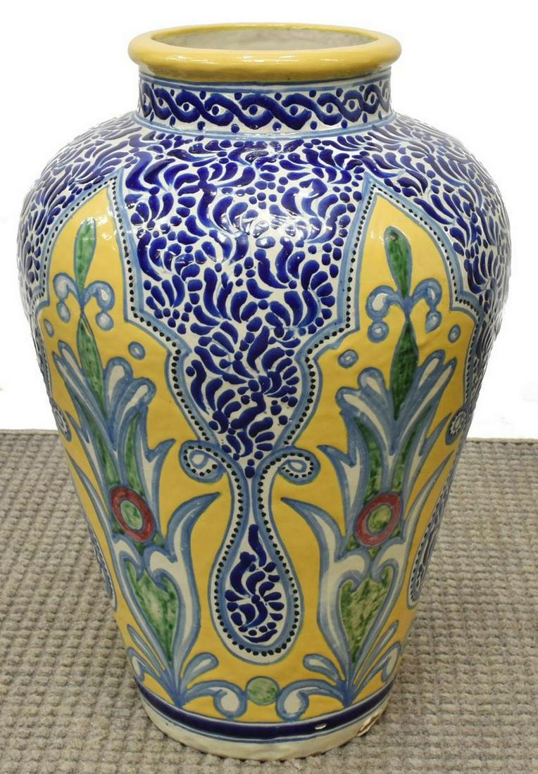 CASA RUGERIO TALAVERA TIN-GLAZED EARTHENWARE VASE: Talavera tin-glazed earthenware vase, signed Casa Rugerio, Puebla, Mexico, having blue foliate motif, approx 24"h, 16"diam Start Price: $150.00