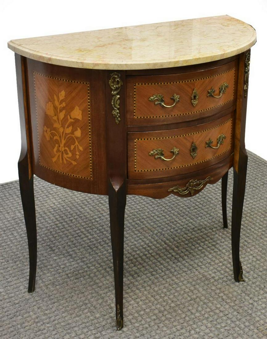 PETITE LOUIS XVI STYLE MARQUETRY DEMILUNE COMMODE: French Louis XVI style marble-top demilune side commode, early 20th c., the molded marble top, over two drawers accented by contrasting inlaid string, side panels display floral marquetry, rising on s