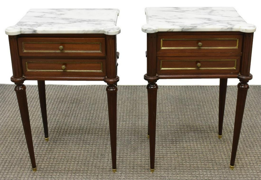 2) LOUIS XVI STYLE MARBLE-TOP MAHOGANY NIGHTSTANDS: (pair) French Louis XVI style mahogany nightstands, early 20th c., each having marble top, with extended rounded corners, over two drawers, with gilt pulls and borders, flanked by fluted sides, all ri