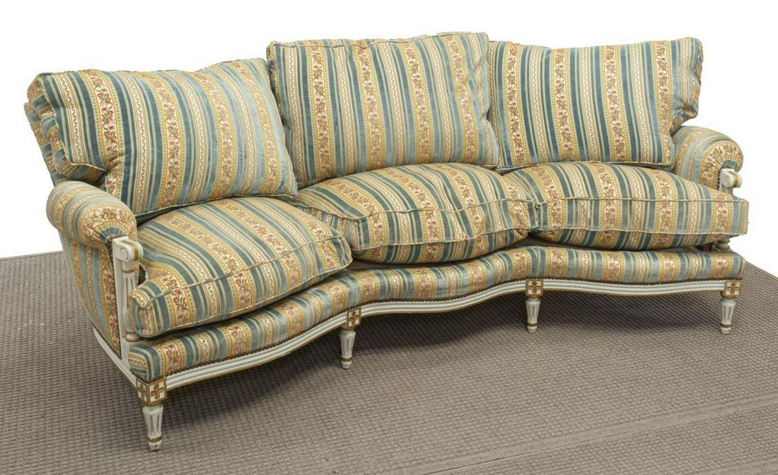 FRENCH LOUIS XVI STYLE UPHOLSTERED PAINTED SOFA: French Louis XVI style sofa, early 20th c., painted frame, having floral velvet upholstery and cushions, nail head trim, on short fluted tapered legs, approx 30"h, 72.5"w, 40"d Start Price: $300.00