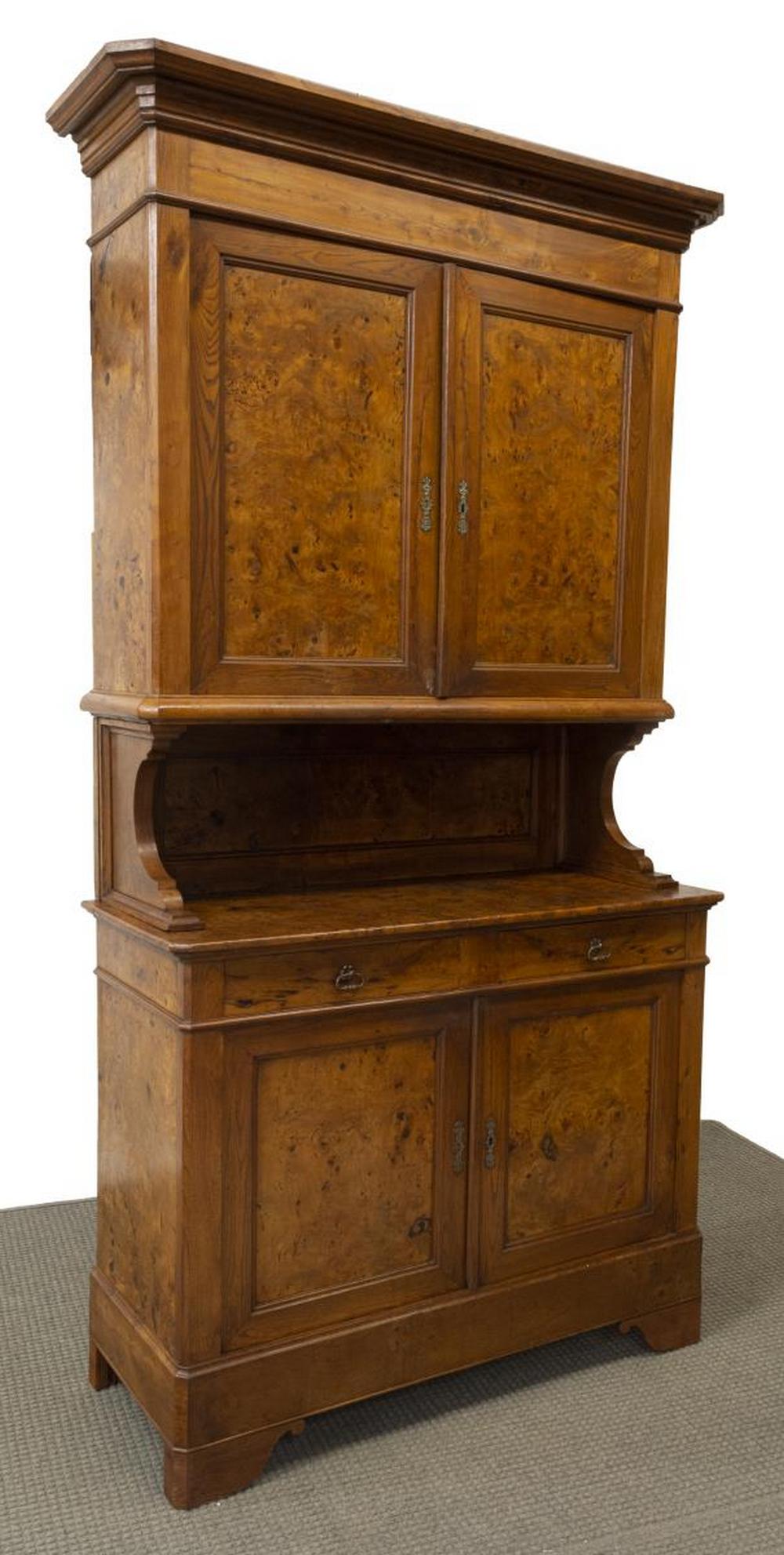 FRENCH LOUIS PHILIPPE PERIOD BURLWOOD CABINET: French Louis Philippe period burlwood cabinet, mid 19th c., molded cornice over double doors, lower case fitted with two drawers over two doors, opening to interior shelf, rising on bracket feet, appr