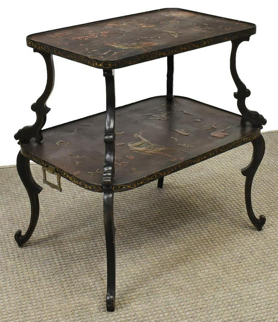 JAPONISME TWO-TIER SERVICE TABLE: Japonisme service table, early 20th c., two tiers with birds and flowers in relief, lower tier with brass bracket handles, rising on scrolled legs, approx 32.75"h, 32"w, 22"d Start Price: $100.00
