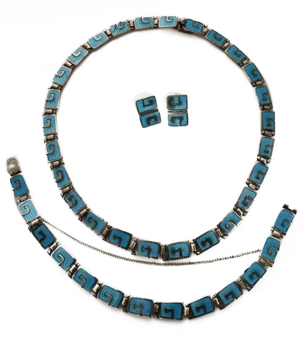 MARGOT DE TAXCO ENAMELED STERLING JEWELRY SET: (lot) Sterling silver jewelry, Margot de Taxco (Margot Van Voorhies Carr, American, 1896-1985), Mexico, mid 20th c., individual links with aqua blue enamel, squared spiral pattern, including: (1) neck