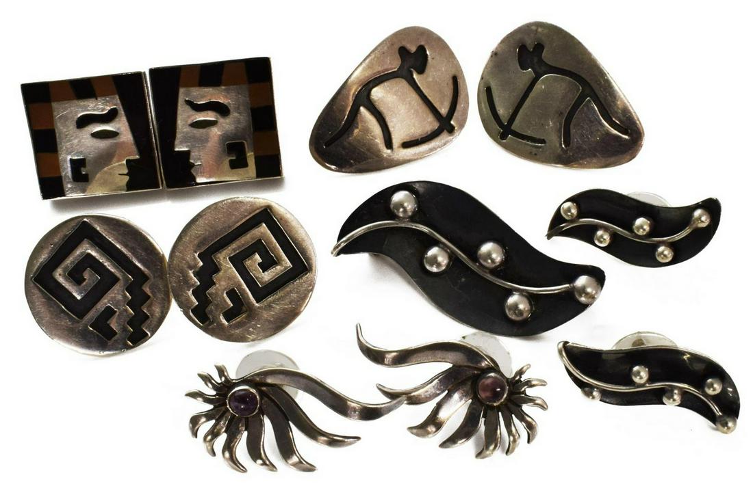 (LOT) MODERNIST MEXICO STERLING SILVER JEWELRY: (lot) Modern sterling silver jewelry, Mexico, highlights include: (pair) square earrings, hallmarked TC, Pre-Columbian inspired mask inlaid with black stone and mixed metal, post backs, (one) lacking