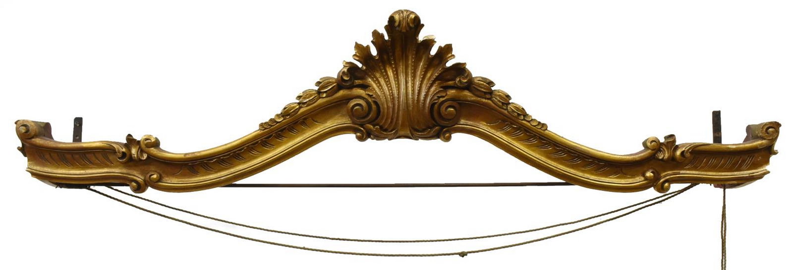 LOUIS XV STYLE GILTWOOD PELMET VALANCE: Louis XV style architectural giltwood pelmet/ valance, 20th c., central scrolling foliate crest, metal hanging bar for curtains, approx 15"h, 63"w, 13.5"d Start Price: $100.00