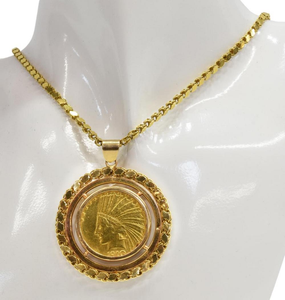 TEN DOLLAR LIBERTY INDIAN HEAD GOLD COIN NECKLACE: 1910 United States ten dollar gold coin, Liberty in a feathered headdress on the obverse, reverse with eagle, coin designed by Augustus Saint-Gaudens (American, 1848-1907), coin only weighs 16.718 gra