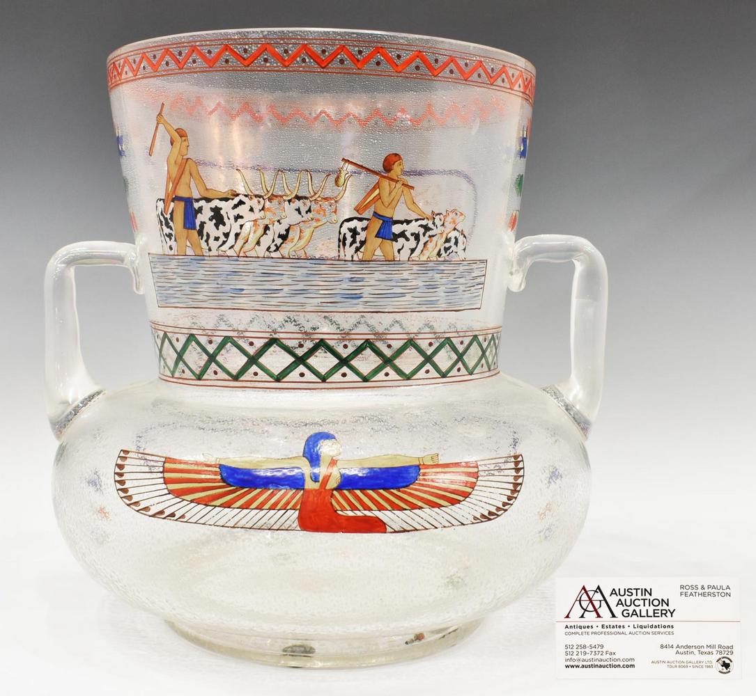 UNUSUAL LARGE MOSER EGYPTIAN REVIVAL GLASS URN: Rare Egyptian Revival glass urn, Moser Glassworks, Karlsbad, c.1895-1896, iridized surface, with applied angular bracket handles, hand-painted enamel designs based on ancient Egyptian motifs, includin
