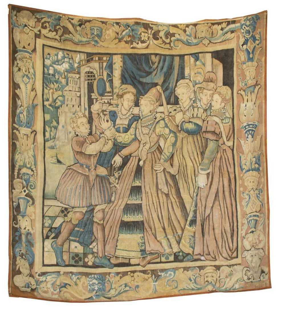 FINE HAND-WOVEN FRANCO-FLEMISH HANGING TAPESTRY: Hand-woven tapestry, likely French or Flemish, 18th c., depicting courtly figures dressing a royal woman, with one figure holding a hand mirror, framed by border with scrolling foliates and masks, dis