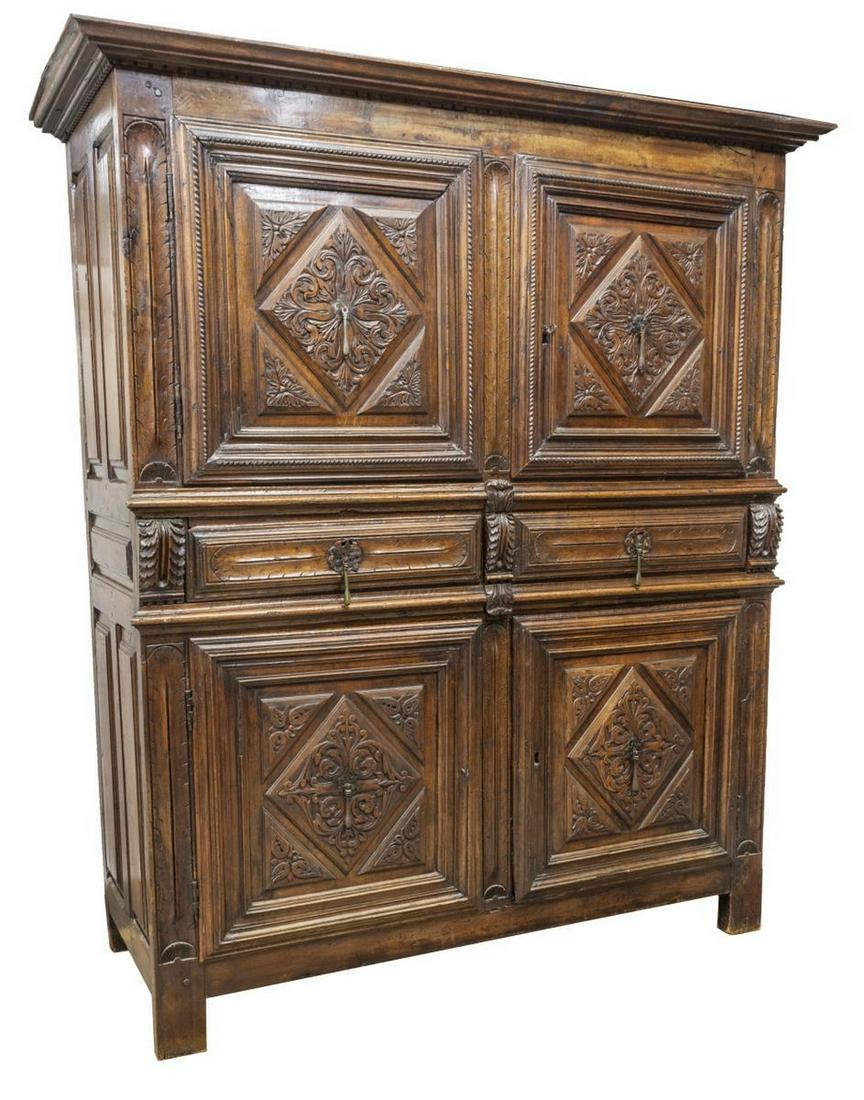 FRENCH PROVINCIAL BRETON CABINET, 18TH C.: French Provincial cabinet, likely Brittany, 18th c., stepped cornice with dentil molding, two upper cabinet doors with foliate diamond paneling, two medial drawers over two additional cabinet doors, c