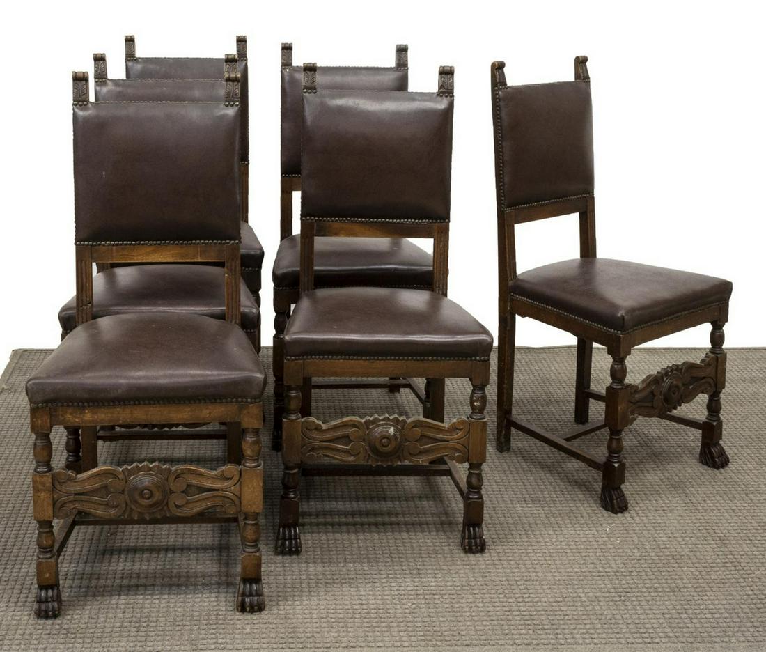 6)ITALIAN RENAISSANCE REVIVAL WALNUT DINING CHAIRS: (lot of 6) Italian Renaissance Revival walnut dining chairs, early 20th c., each having foliate carved finials, over brown faux leather upholstered back and seat, with nail head borders, fluted back r