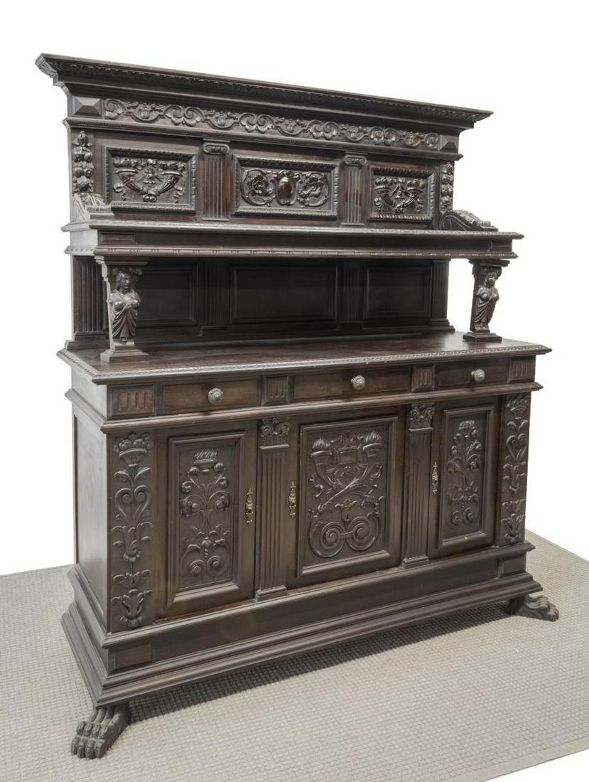 ITALIAN RENAISSANCE REVIVAL CARVED SIDEBOARD: Italian Renaissance Revival carved sideboard, early 20th c., a molded cornice atop an open backsplash, single shelf over lower case, fitted with three drawers and cabinet doors, all heavily accented w