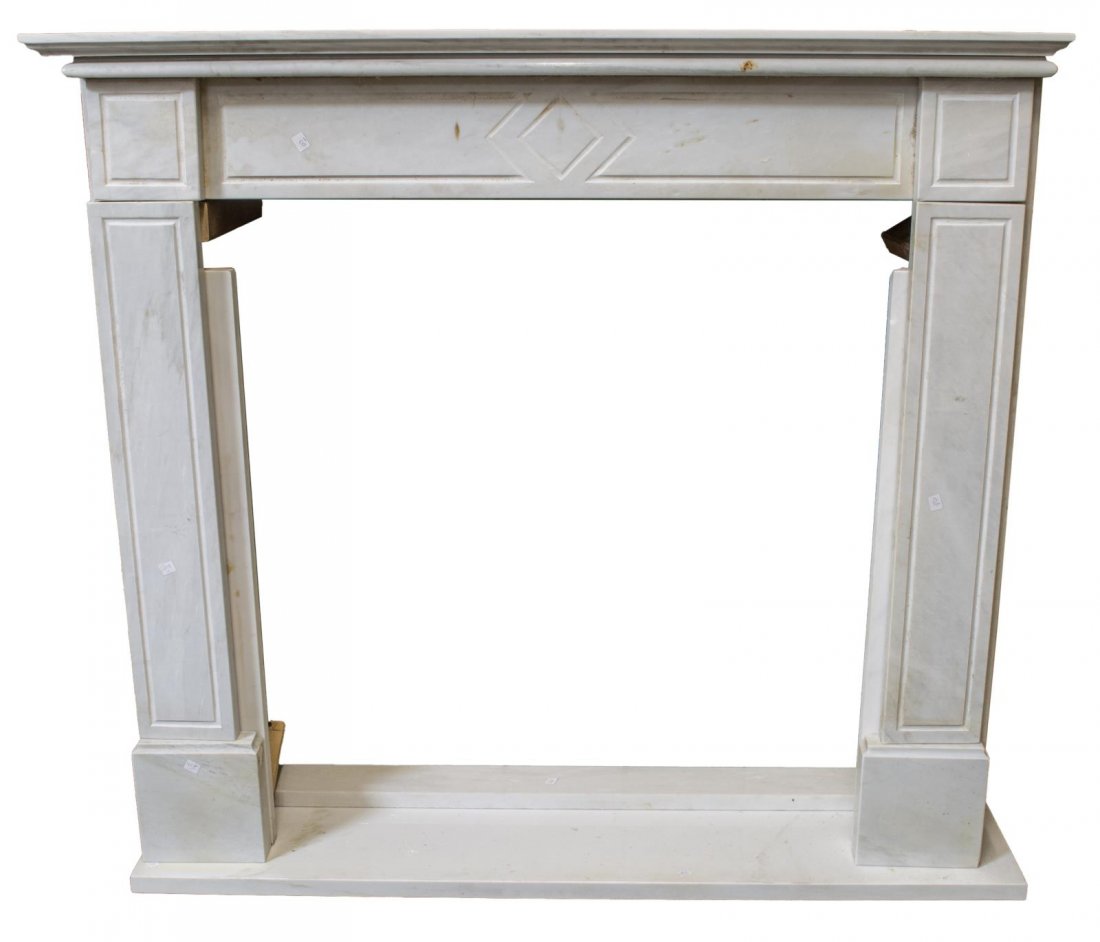 ITALIAN CARRARA MARBLE FIREPLACE MANTEL SURROUND: Italian Carrara marble fireplace mantel and surround, 20th c., exterior: approx 49.25"h, 53.25"w, 12.5"d, interior: approx 39.5"h, 35.5"w Start Price: $400.00
