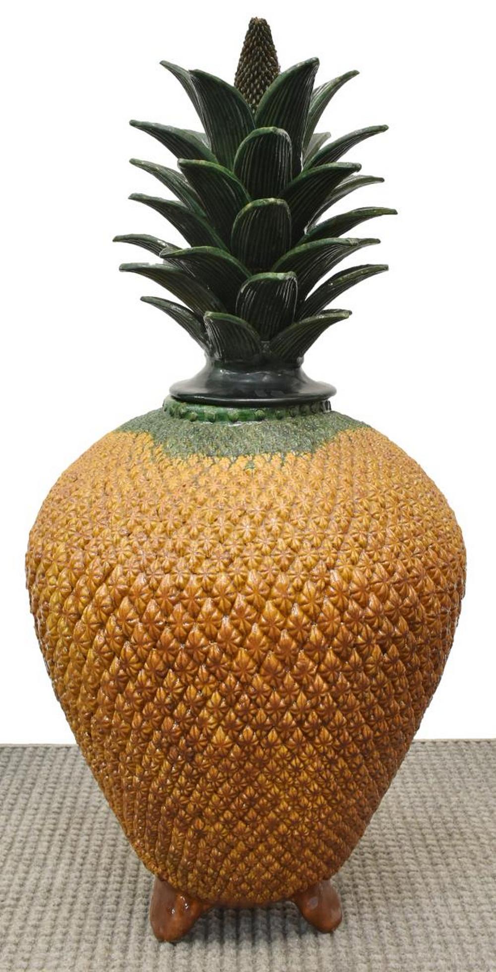 EARTHENWARE PINEAPPLE-FORM URN, MICHOACAN, MEXICO: Large earthenware pineapple-form floor urn, Michoacan, Mexico, 20th c., restoration to one leaf, approx 38"h, 20"diam Start Price: $80.00