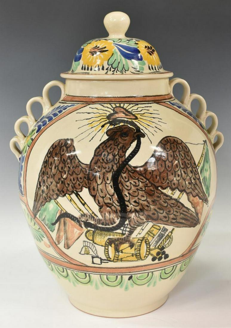 GORKY GONZALEZ TIN-GLAZED LIDDED URN EAGLE & SNAKE: Large tin-glazed earthenware lidded urn, Gorky Gonzalez (1939-2017), Mexico, decorated with an eagle and snake from the coat of arms of Mexico, signed GTO. Mexico, approx 18"h, 12"diam, 11.5lbs Start 