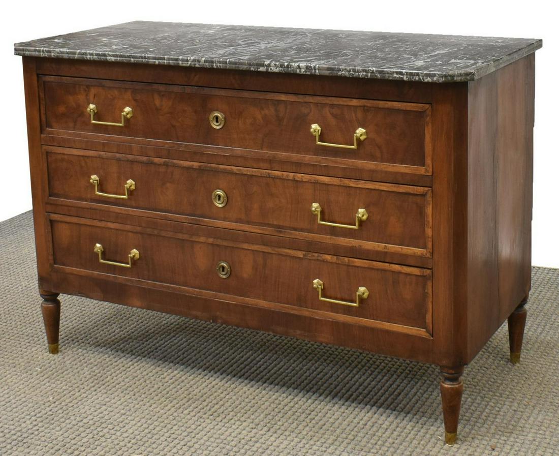 FRENCH LOUIS XVI STYLE MARBLE-TOP WALNUT COMMODE: French Louis XVI style marble-top walnut commode, late 19thc., marble top over three drawers, with gilt metal escutcheons and pulls, rising on tapered legs, approx 32.5"h, 47.5"w, 21.5"d Start Price: 