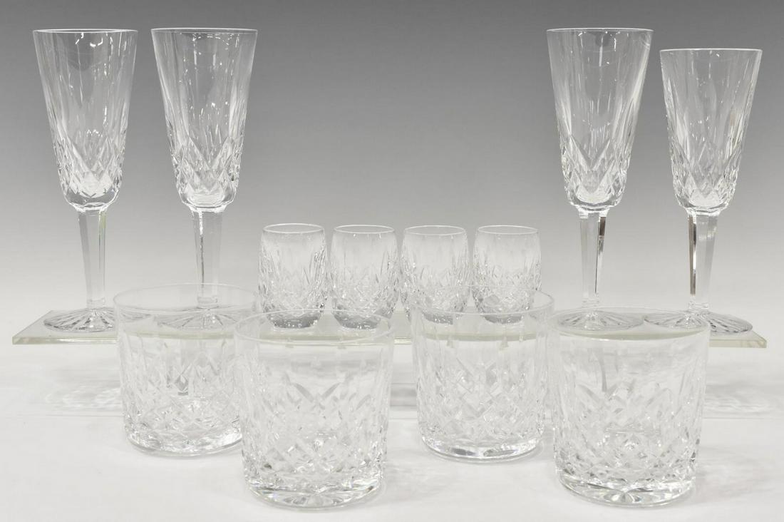 12) WATERFORD 'LISMORE' BARWARE TUMBLERS CHAMPAGNE: (lot of 12) Waterford cut crystal barware, all in "Lismore" pattern, bearing acid etched mark underfoot, comprising: (4) shot glasses, approx 2.5"h, 1.75"diam, (4) champagne flutes, of similar size, l