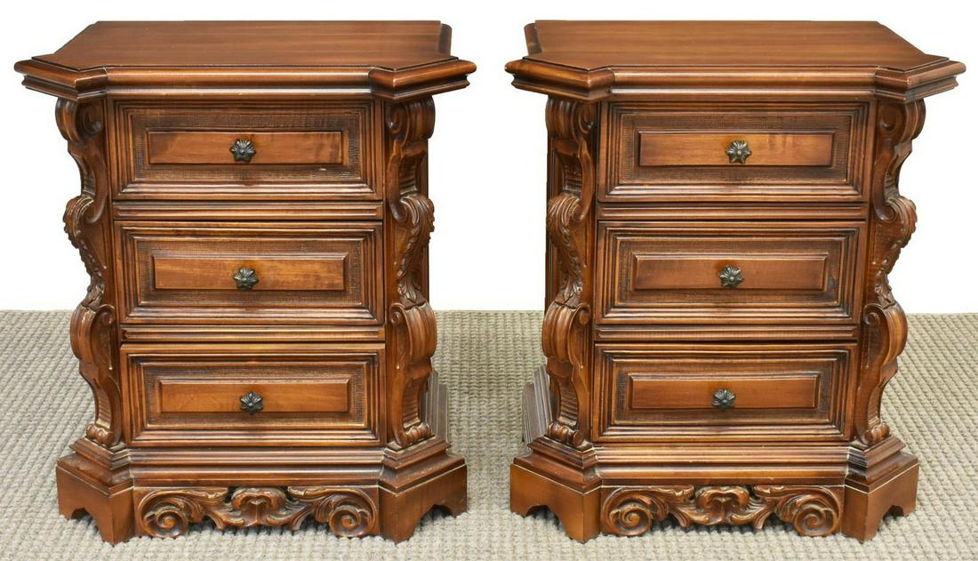 (2) ITALIAN BAROQUE STYLE WALNUT BEDSIDE CABINETS: (pair) Italian Baroque style walnut bedside cabinets, 20th c., corniced top over three drawers, with a foliate carved apron, round brass handles, rising on bracket base, approx 28"h, 26"w, 16"d Start 
