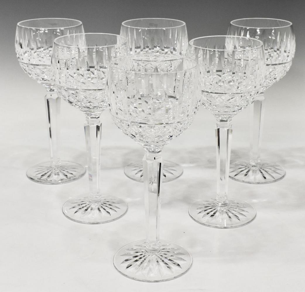 (6) WATERFORD 'MAEVE TRAMORE' CRYSTAL WINE HOCKS: (lot of 6) Waterford "Maeve Tramore" cut crystal wine hocks, with vertical and crossed cuts, on a tapered stem, acid-etched maker's mark underfoot, approx 7.5"h, 3"diam; 4.25lbs total **Note: addition