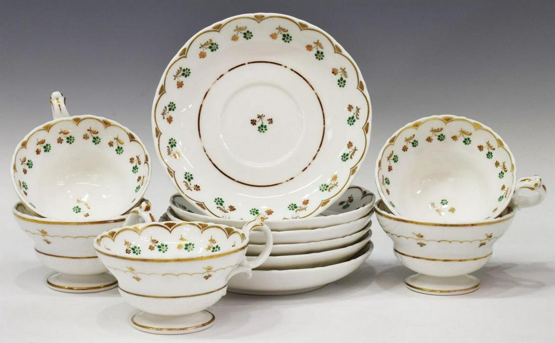 (11) HAND-PAINTED PORCELAIN SHAMROCK TEA SET: (lot of 11) Hand-painted porcelain tea service, with green and gilt floral and shamrock motifs, including: (5) handled cups, (6) saucers, approx 5 7/8"diam; 3.75lbs total Start Price: $50.00