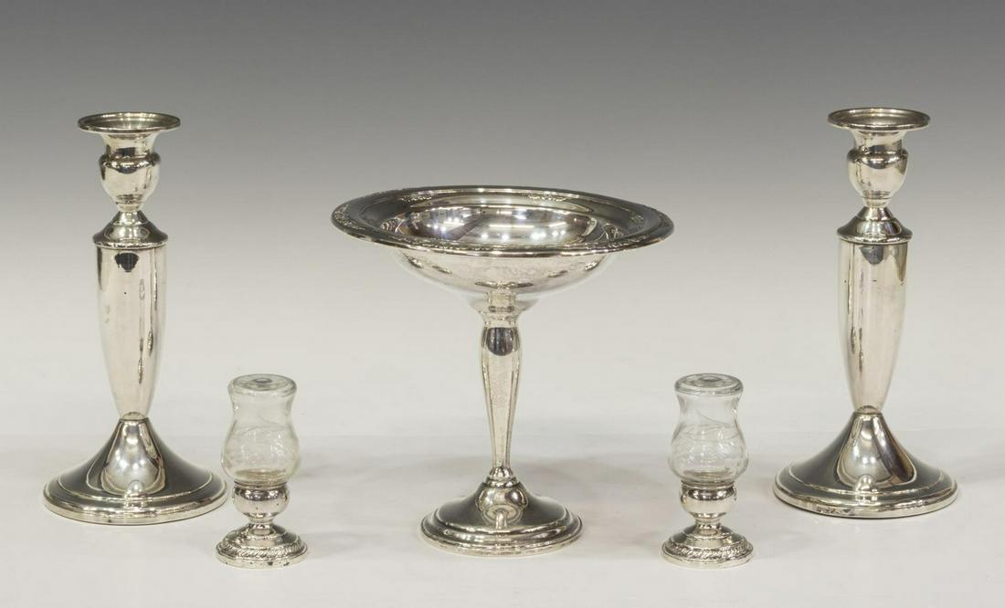 (5) WEIGHTED STERLING SILVER CANDLESTICKS, COMPOTE: (lot of 5) Sterling silver tableware, all weighted, including: (1) International sterling silver compote, Courtship T200 pattern, approx 6"h, 6.25"diam, (pair) Newport sterling silver salt and pepper 