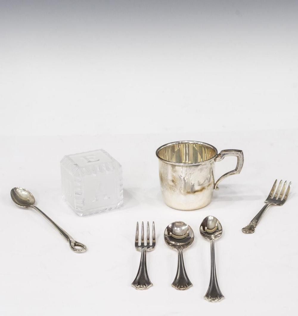 (7) BABY ITEMS, PERETTI TIFFANY STERLING SPOON: (lot of 7) Baby accessories, including: (1) "Padova" sterling silver feeding spoon, designed by Elsa Peretti (Italian, b.1940) for Tiffany and Company, c.1984, in Tiffany branded sleeve, approx 6 1/8"