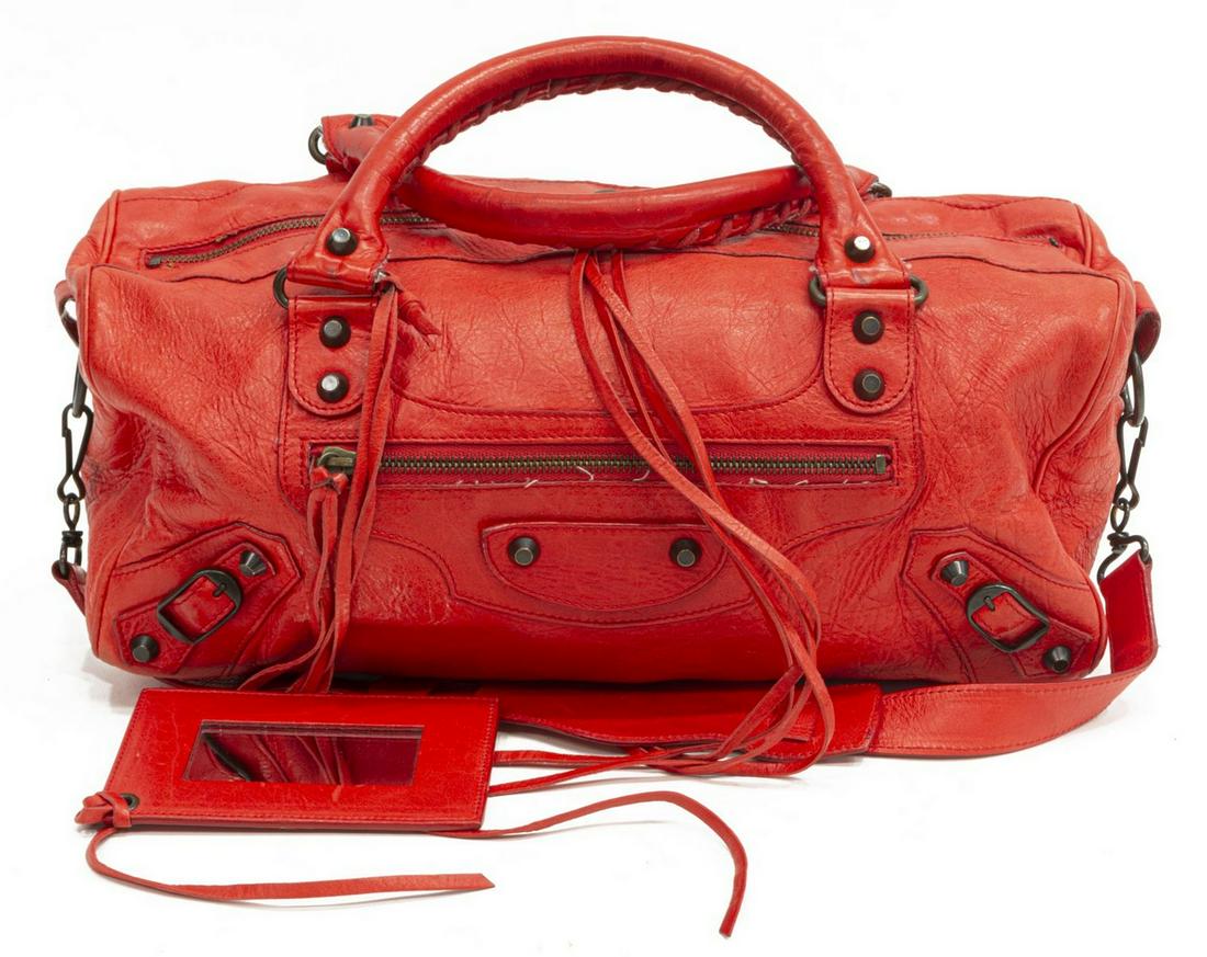 BALENCIAGA 'MOTOCROSS CLASSIC TWIGGY' HANDBAG: Balenciaga "Motocross Classic Twiggy" handbag, in vermilion arena leather, with antiqued brass hardware, tonal leather trim, dual rolled top handles with whipstitch accent and detachable flat shoulder