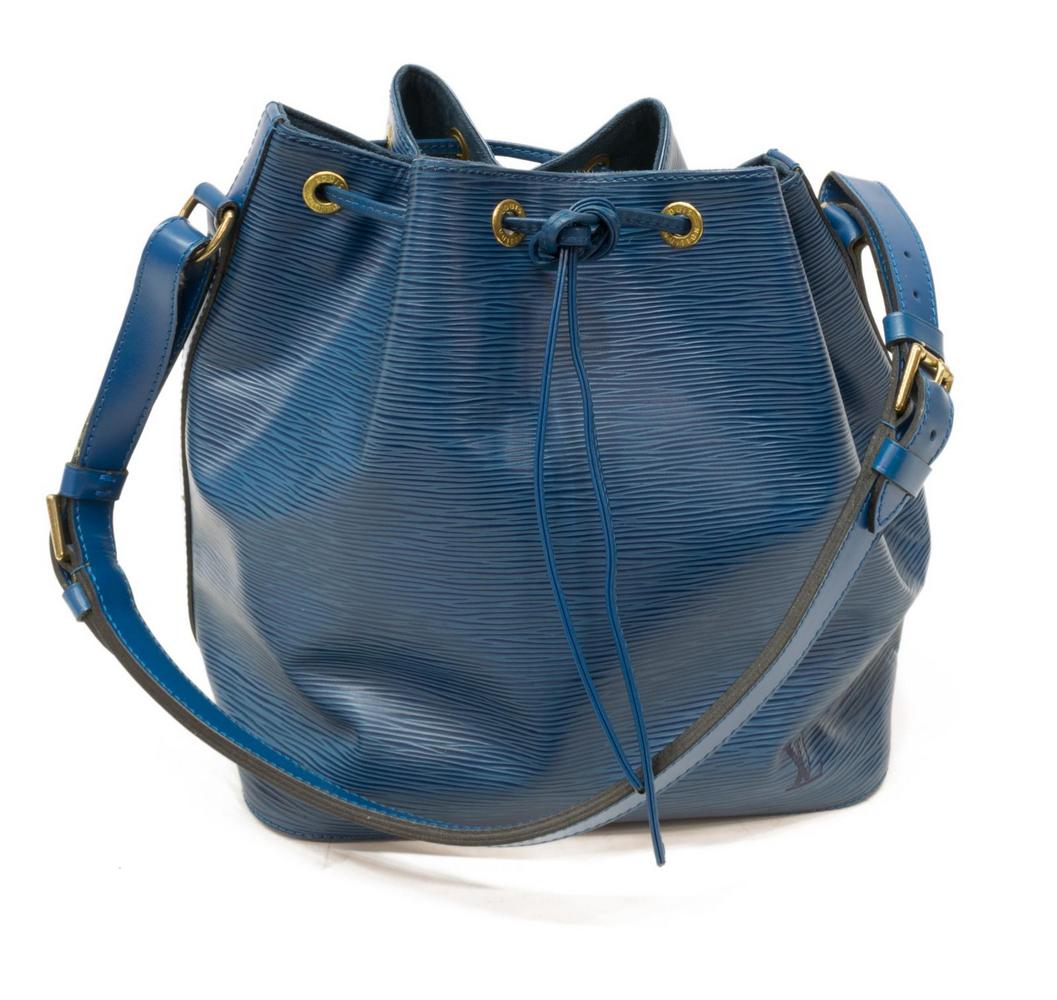 LOUIS VUITTON 'NOE PM' BLUE EPI LEATHER BUCKET BAG: Louis Vuitton "Noe PM" bucket bag, in blue Epi leather, with brass hardware, adjustable flat shoulder strap, drawstring closure, measurements for shipping purposes only: approx 9.5"h, 15"w, 7.25"d, 1.