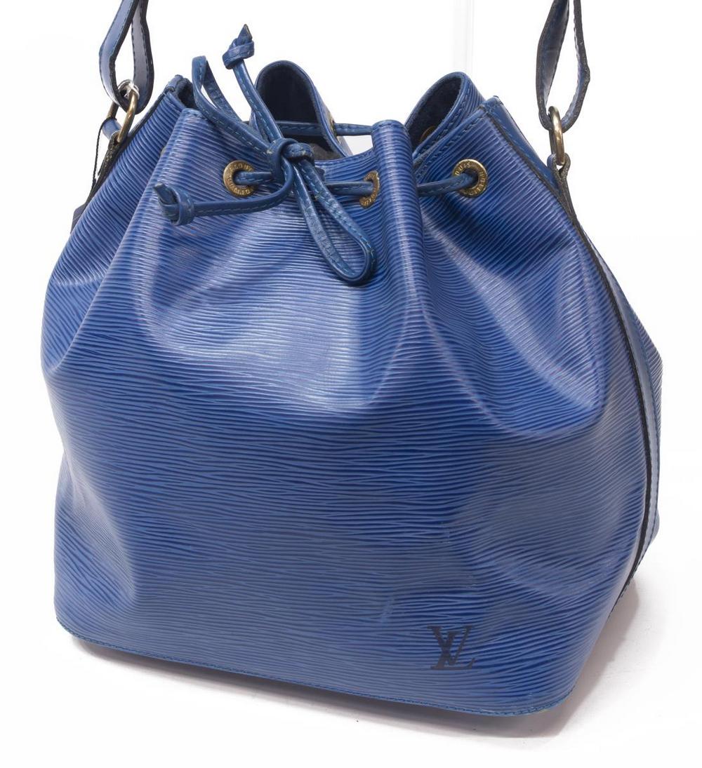 LOUIS VUITTON 'NOE PM' BLUE EPI LEATHER BUCKET BAG: Louis Vuitton "Noe PM" bucket bag, in blue Epi leather, with brass hardware, adjustable flat shoulder strap, drawstring closure at front face opening to tonal Alcantara lined interior, creasing, sligh