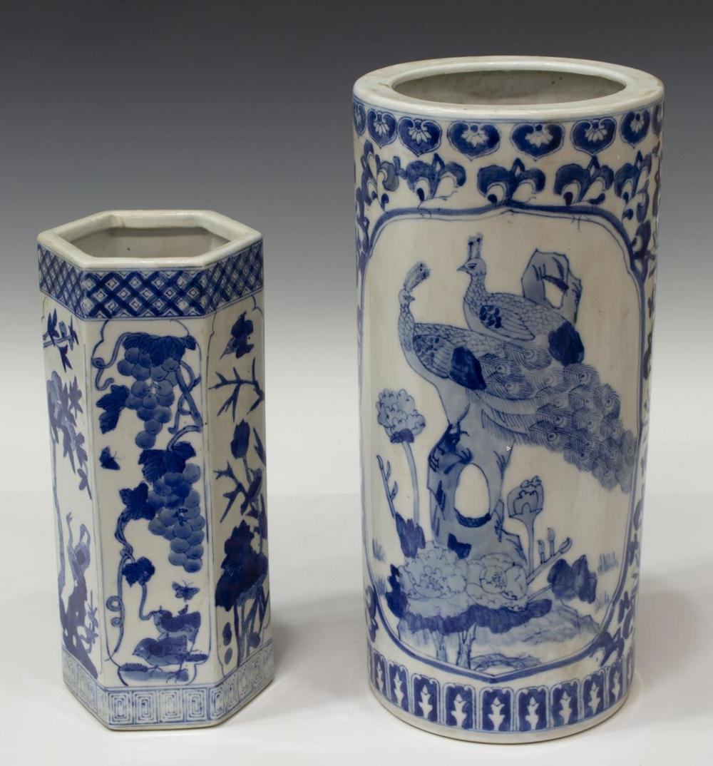 (2) CHINESE BLUE & WHITE PORCELAIN HAT STANDS: (lot of 2) Chinese blue and white porcelain hat stands, including: (1) cylindrical, with ruyi head border, reserves with peacocks and pheasants, marked underfoot as pictured, approx 14.75"h, 6.75"diam