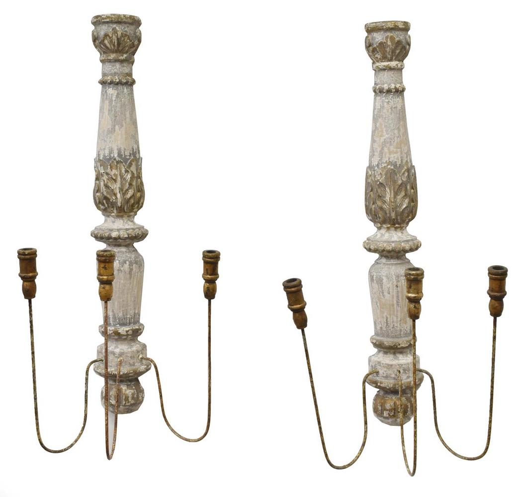 (2) PARCEL GILT & PAINTED CANDLE SCONCES: (lot of 2) Candle sconces, late 20th c., parcel gilt and distressed painted half baluster standard, issuing three iron arms, ending in giltwood candle cups, approx 34"h, 15.5"w, 10"d Start Price: $50.
