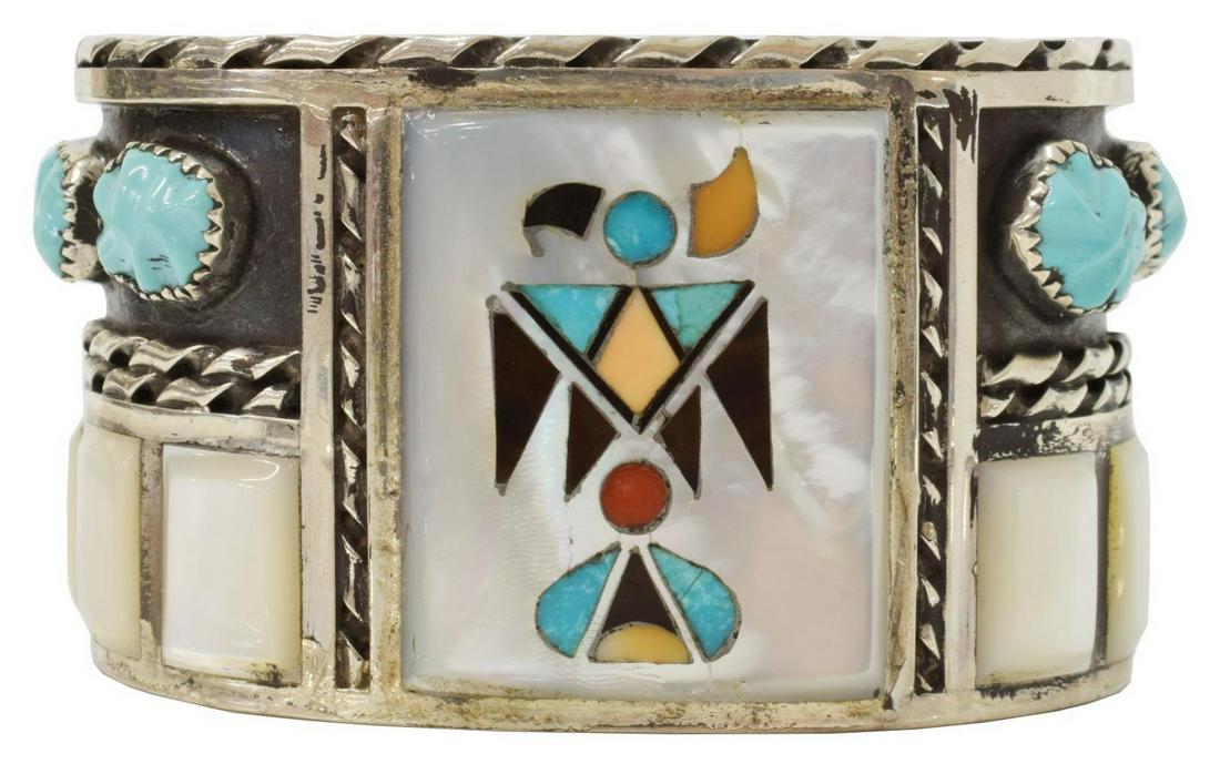 FLORENTINE & LELA PANTEAH ZUNI MOSAIC INLAID CUFF: Native American silver (content unknown) cuff bracelet, Florentine and Lela Panteah (Zuni, New Mexico), with central mosaic inlaid bird of turquoise, red coral, and others on mother of pearl ground, f