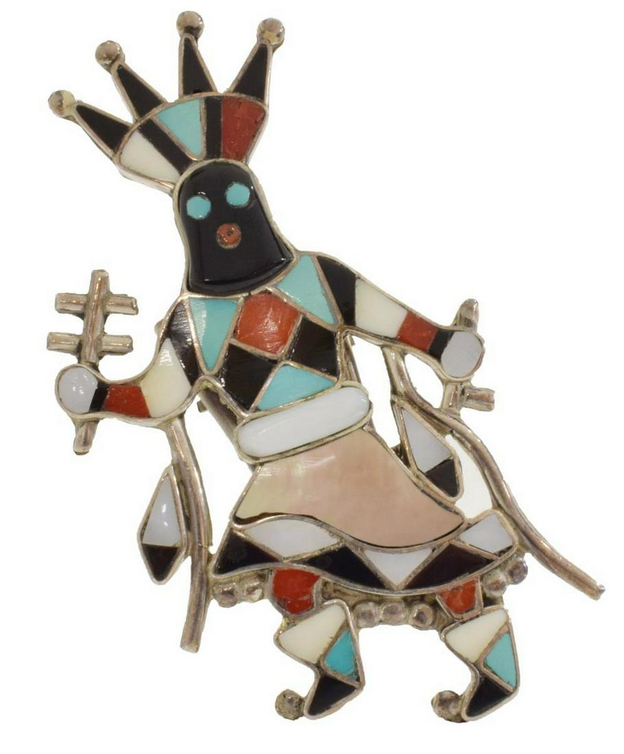 VERA LUNA ZUNI APACHE CROWN DANCER BOLO TIE SLIDE: Native American silver (content unknown) bolo tie slide/ ornament, V. Luna (Vera Luna, Zuni, 1930-1982), multi stone inlay Apache Crown Dancer with turquoise, red coral, shell, and jet, approx 3 1/8"h