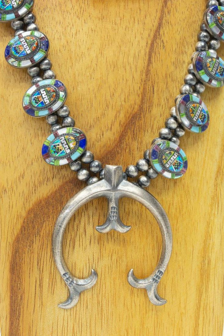 SOUTHWEST MICRO INLAY SILVER NAJA NECKLACE: Southwest sterling silver necklace, beaded strand, six oval stations, micro inlay with turquoise, mother of pearl, abalone, etc., central crescent-shaped naja, marked S with a star, approx 23.5"l, naj