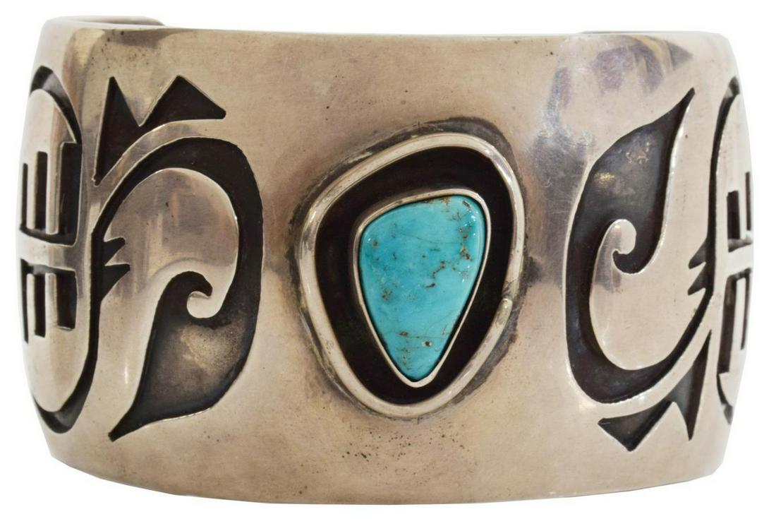 NATIVE AMERICAN SILVER OVERLAY & TURQUOISE CUFF: Native American silver (content unknown) overlay cuff bracelet, with central triangular bezel-set turquoise cabochon, approx 1.75"w, interior: (end to end) approx 6"l, gap: approx 1.5"w, 84.5 grams (i