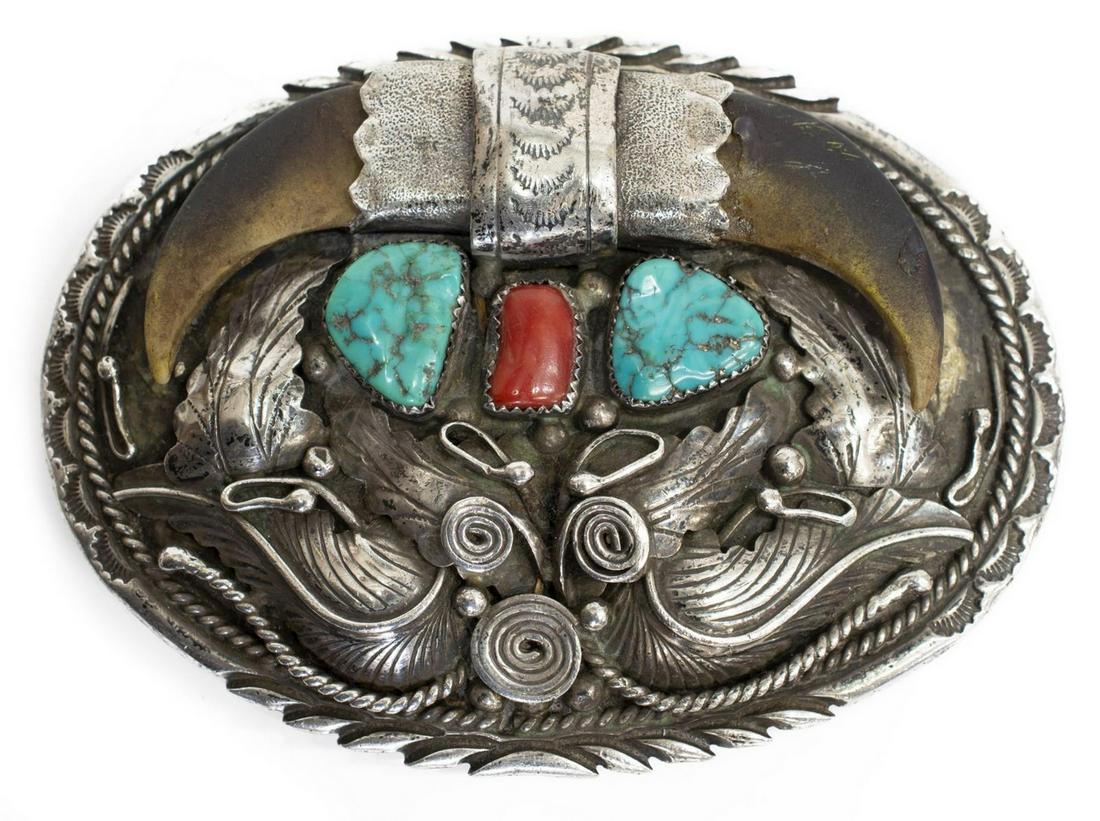 NATIVE AMERICAN NAVAJO STERLING SILVER BELT BUCKLE: Native American sterling silver belt buckle, likely Navajo, with faux bear claws, turquoise and red coral, stamped TKE sterling, approx 4"l, 3"w, 99.1 grams (inclusive of all materials) Start Price: $