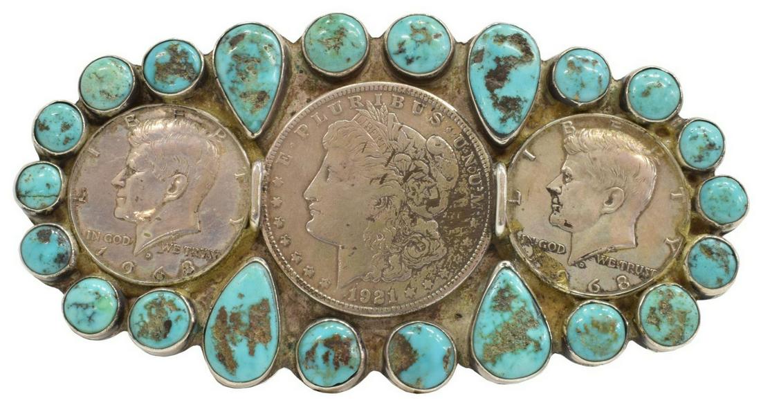 INDIAN MORGAN & KENNEDY COINS TURQUOISE PIN: Native American silver (content unknown) brooch/ pin, two Kennedy half dollars dated 1968, one Morgan silver dollar dated 1921, surrounded by eighteen round turquoise cabochons, four pear shaped, lack