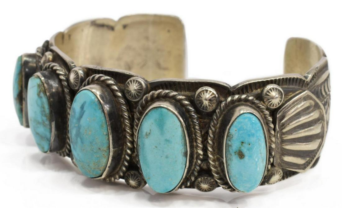 TILLIE JON NAVAJO STERLING & TURQUOISE CUFF: Native American sterling silver cuff bracelet, signed T. Jon (Tillie Jon, Navajo, 20th c.), with five turquoise cabochons, stamped shoulders, approx 7/8"w, interior: (end to end) approx 6"l, gap: appr