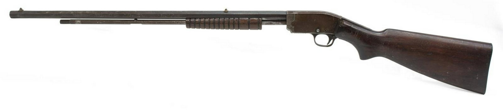 MOSSBERG PREMIER MOD K PUMP .22 SLLR RIFLE: Mossberg Premier Model M takedown rifle, slide action, .22 SLLR caliber, tubular magazine, 24" octagonal barrel, fixed sights, ribbed forestock, hardwood rear stock, stock chipped at rear frame tang, 