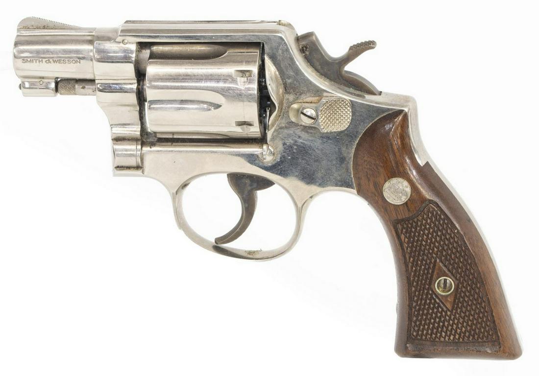 SMITH & WESSON MODEL 10 REVOLVER, .380 CALIBER: Smith & Wesson Model 10 revolver, .380 Spl caliber, double action, six round cylinder, 2" barrel, grooved trigger, nickel finish, S&W wood grips, Safari Land leather holster, SN C545XXX *REQUIRES FFL