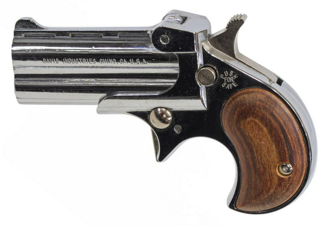 DAVIS INDUSTRIES DERRINGER, .22LR CAL, O/U: Davis Industries Model D22 Derringer, .22LR caliber, 2.4" over/under barrel, wood grips, chrome finish, original box and papers, SN 215104 *REQUIRES FFL TRANSFER* Start Price: $125.00
