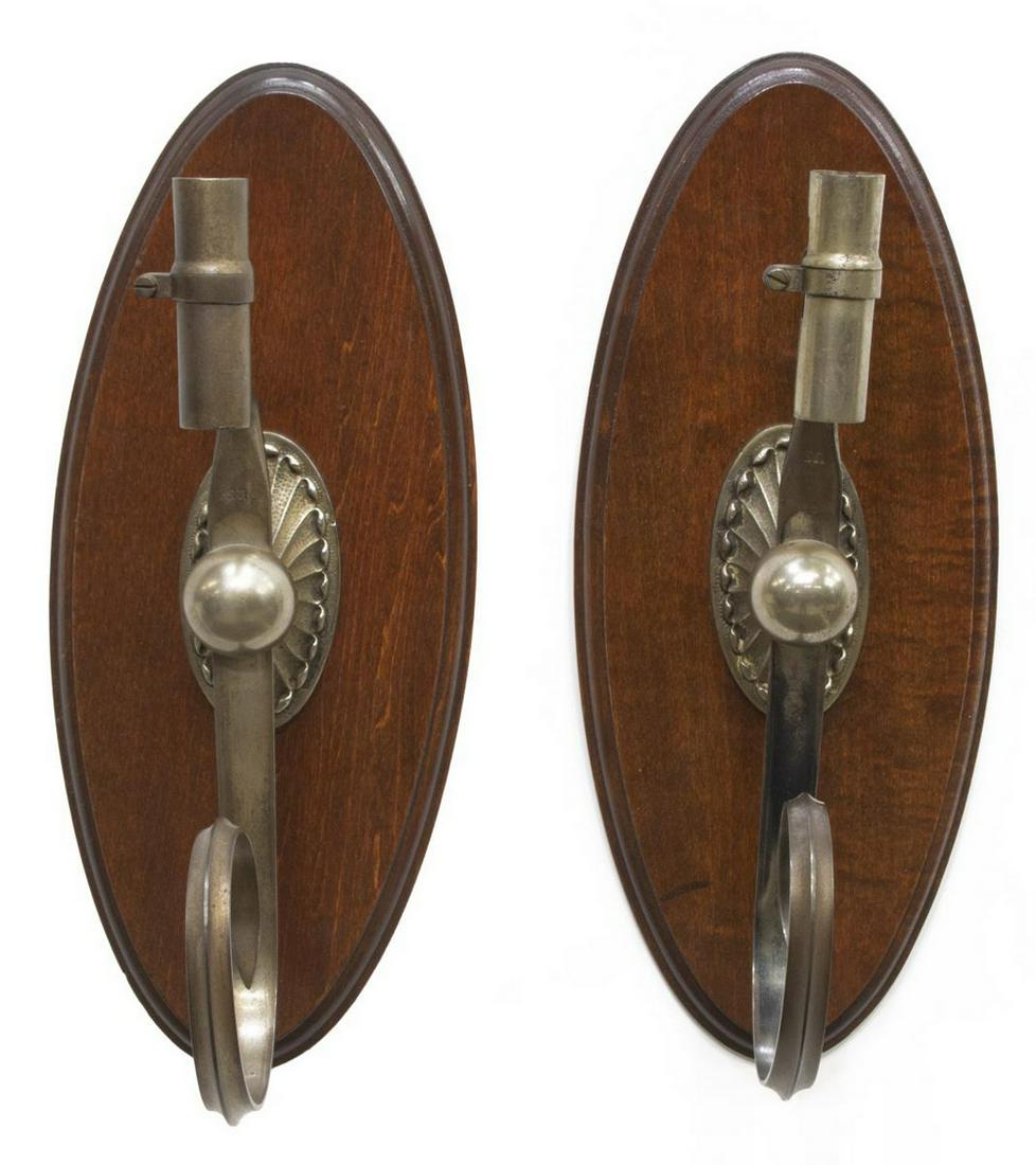 (2) UNITED STATES MILITARY BAYONET CANDLE SCONCES: (lot of 2) Iron candle wall sconces, each fashioned from a United States military socket bayonet, 19thc., marked US, mounted on an oval wood backing, approx 14.5"h, 6"w, 7"d, 1.75lbs **Provenance: Fro