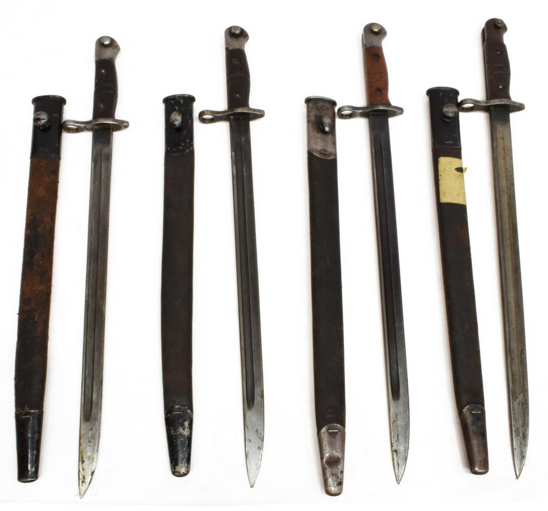 (4) U.S. REMINGTON BRITISH ENFIELD P-14 BYONETS: (lot of 4) U.S. Remington bayonets manufactured for the WWI British Enfield P-14 rifle, each marked at the ricasso within a circle "Remington" and marked 1913, the opposite ricasso with British inspec